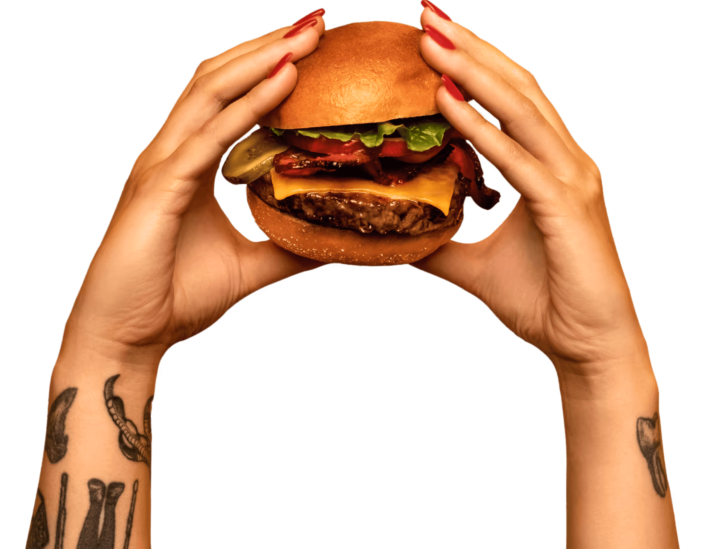 Two hands holding a bacon cheeseburger