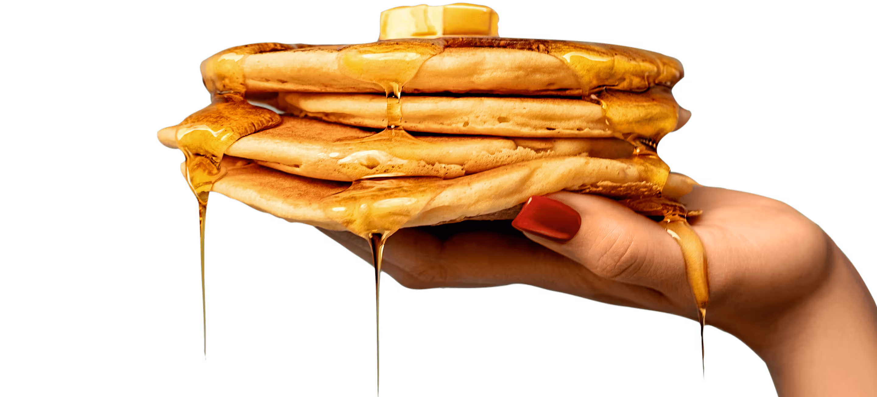 A stack of pancakes with butter and syrup, held in one hand